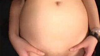 Asian beauty rubs her pussy - porn video