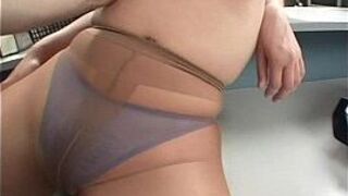 Lady in pantyhose is pleasured as man licks her tits - porn video